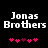 Pixelated text 'Jonas Brothers' in white on black background with pink and purple heart symbols below, two identical frames side-by-side.