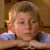 A split-frame contact sheet showing a pixelated image of a child on the left and green text reading "Original Icons .com" on the right against a dark background.