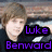 A pixelated image of a person with light brown hair wearing a black shirt, positioned against a blurred background.