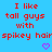 Red pixelated text on a blue background reads "I like tall guys with spikey hair" repeated three times, each followed by a purple heart symbol.