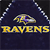 Static pixelated icon featuring a stylized raven mascot above bold yellow text reading 'RAVENS' on a dark blue background with white border accents.