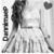 A grayscale anime-style character in a white dress with dark hair, holding a heart symbol and standing beside vertical text.