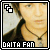nine pixelated images showing a person with short brown hair wearing a dark jacket and black beaded necklace, with 'DAITA FAN' text below each