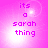Pixelated text 'its a sarah thing' on a pink gradient background with bright light effects, displayed in a