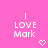 Pixelated text on a pink background with two heart symbols below the text.