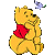 Pixelated static image of Winnie the Pooh character in yellow with red shirt, holding a small blue and green object against gray background.
