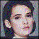 20 distinct portrait images showing a person with short dark hair in various poses and expressions, including hand-to-face gestures and direct eye contact