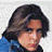 A 48x48 pixel buddy icon featuring a character with long brown hair in a blue jacket, paired with text elements including "EAT MY SHORTS" and "The Breakfast Club" on a gray background.