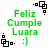 Green text reads 'Feliz Cumple Luara' with a smiley face, surrounded by black square patterns on white background.