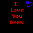 Pixelated red text "I Love You Drew" on black background with blue heart symbol above text.