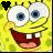 Two side-by-side animated frames of a yellow cartoon character with large eyes, wide smile showing two front teeth, and a black heart on the left frame versus white heart on the right frame against a pixelated green background.