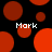 Black background with scattered red circles of varying sizes, some partially cut off, and four instances of the text "Mark" in white pixelated font.