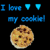 Blue text and pixelated cookies on black background with heart symbols above first cookie image.