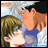 A 48x48 pixel buddy icon featuring a cartoon couple in an embrace on the left, with "Anime IM" and "COM" text on a black background to the right.