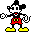Pixelated Mickey Mouse character in red shorts, yellow shoes, black gloves, and a white face with black ears performing sequential walking poses against a plain background.