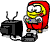 Yellow cartoon character in red outfit holding game controller, seated before black CRT television with antenna on gray background.