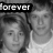 Black-and-white pixelated image of two people with a black banner reading 'forever' above them, set against a gradient background.