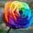A four- of pixelated images: a rainbow rose, a pile of colorful stones, a rainbow-colored horse, and a rainbow peace symbol on black