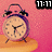 A four- shows a pixelated alarm clock on an orange base against pink background, with text changes and one containing a black heart shape