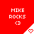 Red background with repeated 'MIKE ROCKS' text and heart symbols in white triangular shapes.
