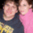 A static image with a blue background, featuring two people on the left and orange pixelated text on the right.
