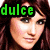 A pixelated image of a person with brown hair, showing three variations of the text 'dulce' in green, yellow, and red above the head.