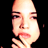 Pixelated close-up of a person's face with hand near mouth, black background, and visible dithering artifacts.