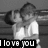 Black-and-white animation of two people embracing, with text reading "I love you" in the lower-left corner.