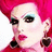 Pixelated image of a person with bright pink hair, teal eyeshadow, and red lipstick on left; right side has purple text reading "Jeffree Star Is LOVE" above "Is LIFE" and "Is MINE =]".