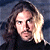 A 50x50 pixel buddy icon split into two sections: a left-side portrait of a person with long hair and dark clothing against a gray background, and a right-side green section with bright green text reading "Original Icons .com" in a stylized font.