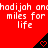Red background with repeated white text and black triangular icons containing red hearts.