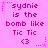 A static image with a pink background displays repeated text "sydnie is the bomb like Tic Tic <3" in purple pixelated font, surrounded by small pink and purple star and dot decorations.