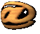 A golden @ symbol rotates in a 3D loop, showing multiple angles against a gray background.