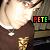 A pixelated image shows a person with light hair and a white shirt, with a colorful 'PETE' text block on the right side.