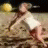 Pixelated image of a figure in white clothing holding a volleyball, with text reading Volley-Ball Angel on the right.