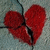 Red broken heart icon with black crack lines on gray background, displayed in three sequential states showing partial animation.
