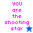 Pixelated text "you are the shooting star" in pink on blue and white backgrounds with a small star icon.