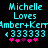 Pixelated cyan text on black background reads Michelle Loves Amber+Kerr <33333 with pink hearts below, showing animation change in heart colors.
