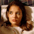 A split-frame contact sheet showing a pixelated image of a woman on the left and green text reading "Original Icons .com" on the right against a dark background.
