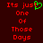 Red pixelated text on dark red background reads "Its just One Of Those Days" with green heart symbol replacing the 'o' in 'just' on left side.