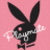 Black bunny silhouette with long ears on pink background, holding a white heart-shaped object in one hand and a small black item in the other.