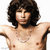Static pixelated image of a shirtless man with dark curly hair and visible chest, wearing a silver chain necklace against a white background.