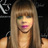 Pixelated static image of a person with long blonde hair and pink lips against dark background, likely from early 2000s AIM buddy icon collection.