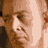 Static image with red text on black background featuring partial face of actor, 'THE CLOSER' title, and 'TNT' logo.