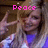 Pixelated image of a person with light brown hair wearing a white and blue top, making a peace sign gesture under pink 'Peace' text.