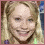Two pixelated frames of a person with blonde hair showing different facial expressions against a pink background.