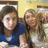 Six- with a photo of two people on the top-left, pixelated text in other , and a smiley face