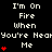 Black background with white pixelated text repeating 'I'm On Fire When You're Near Me' and red heart symbols in a pattern