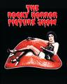 Static image of a person reclining on red lips with dripping blood-style text above, set against black background.