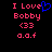 Pixelated text and symbols on black background with red 'I Love Bobby <33 a.a.f' and blue heart symbol.